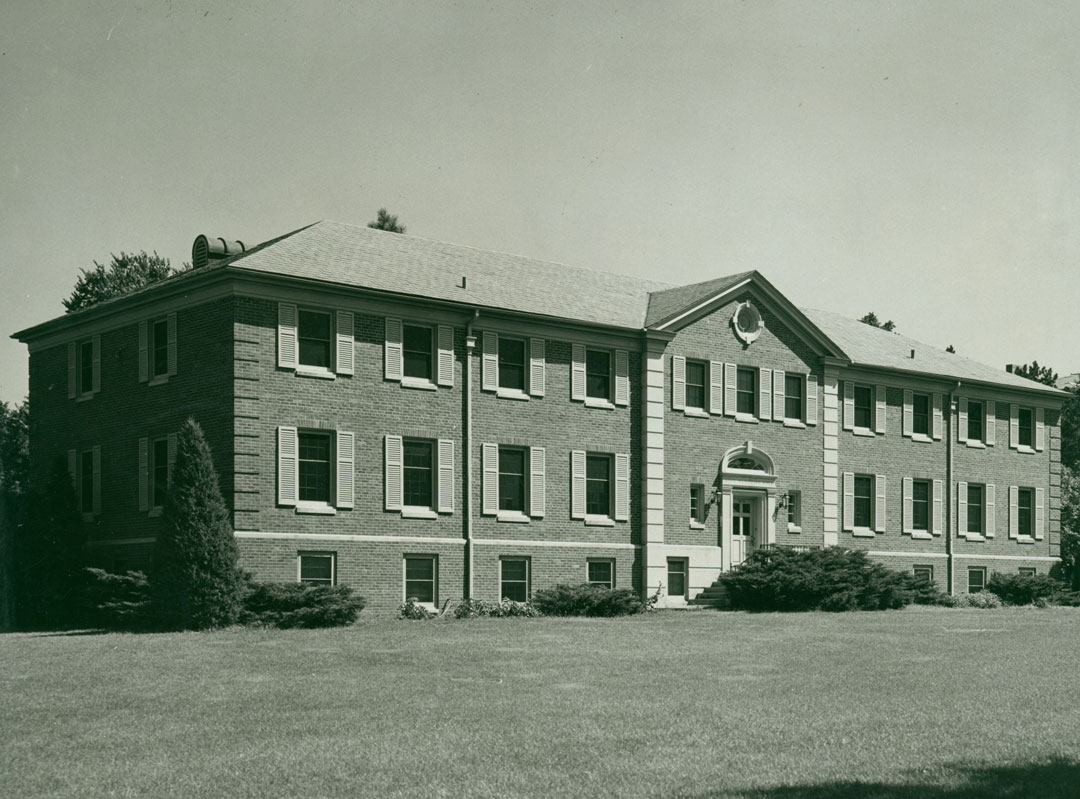 A black and white photograph of the exterior of Love Memorial Hall