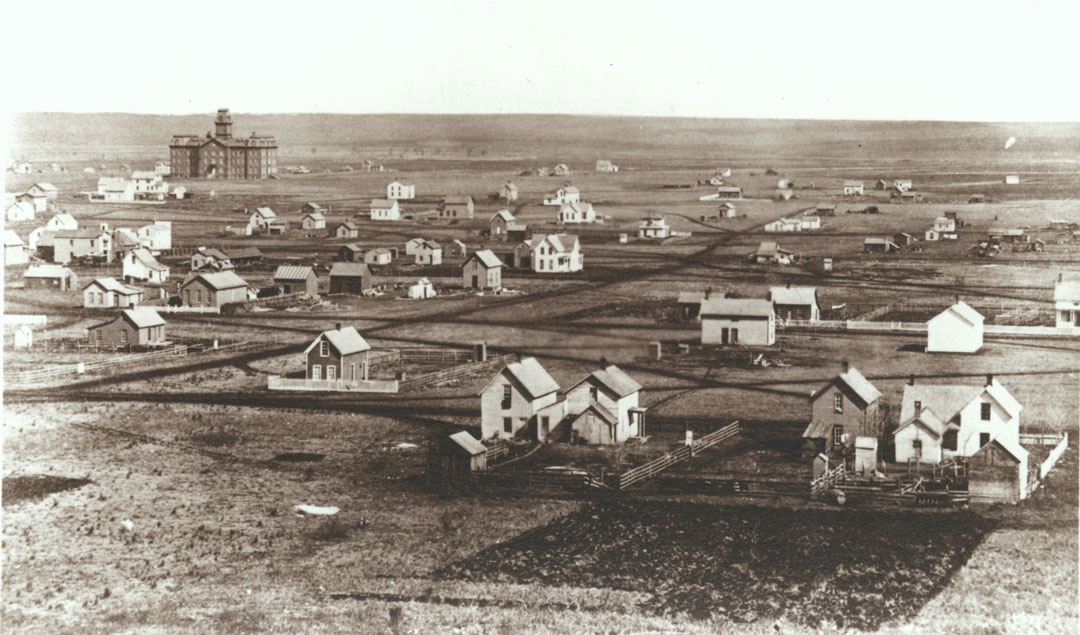 A black and white aerial view photograph of Lincoln