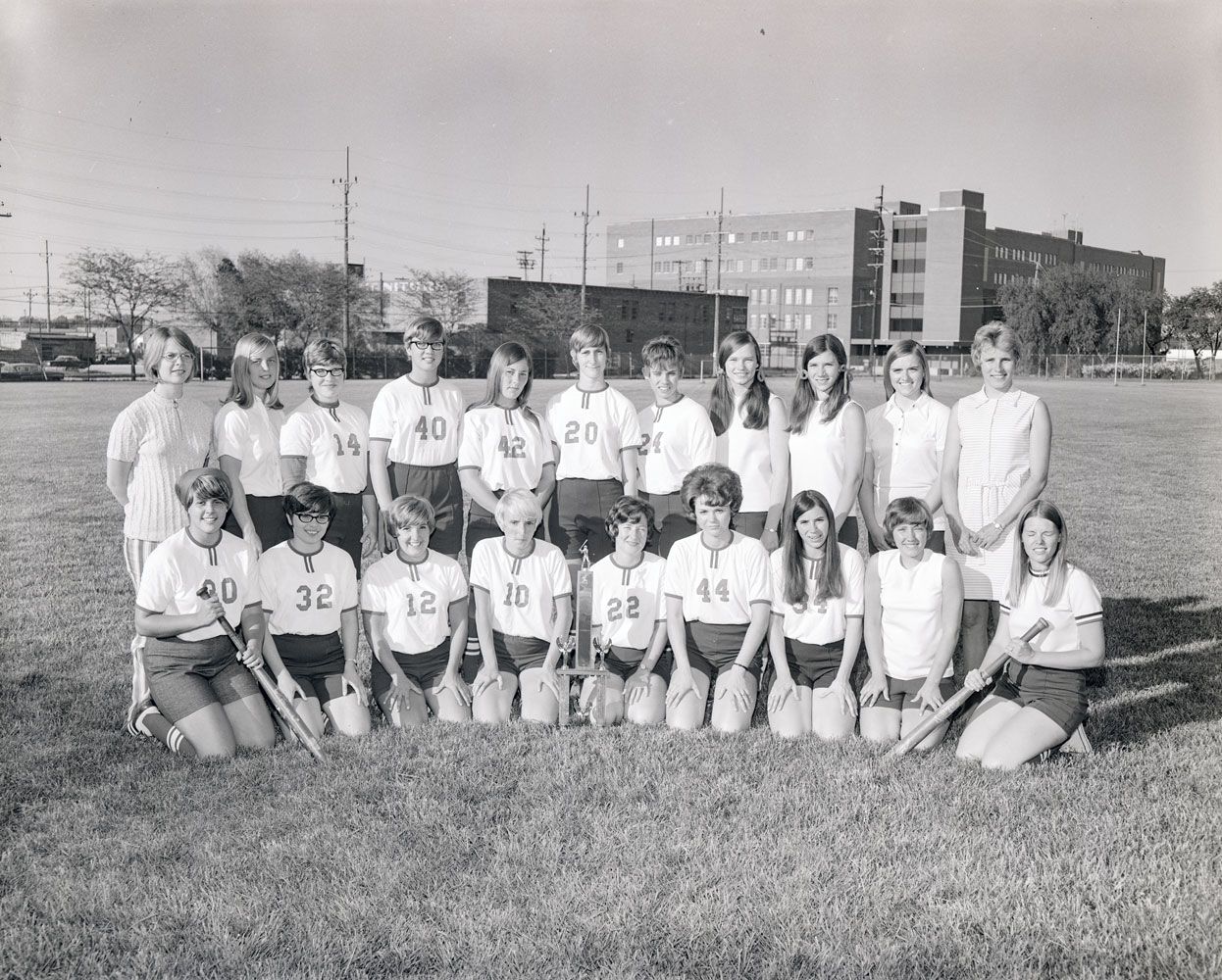 A black and white group portrait of a sports team