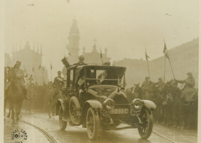 A sepia tone photograph of President Wilson in an automobile