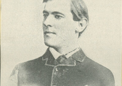 A black and white portrait captioned "Wilson as a professor at Wesleyan"