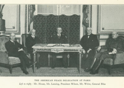 A black and white photograph of the American peace delegation at Paris
